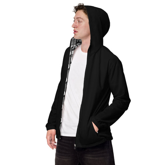 Interior of black FAFO windbreaker — bold FAFO logo all-over print lining FAFO merchandise flag and family outfitters