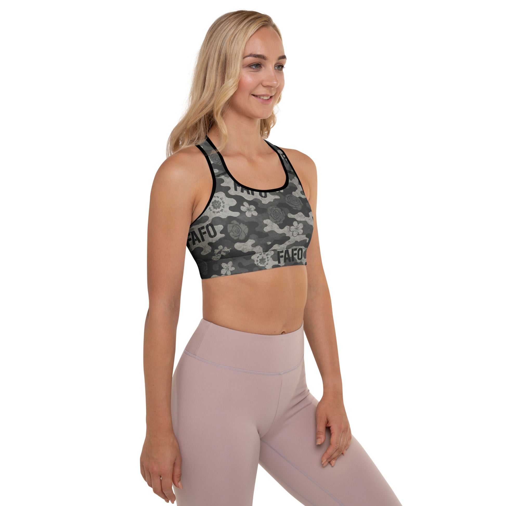 Woman wearing FAFO midnight bloom camo sports bra — patriotic athletic apparel patriotic clothes for women