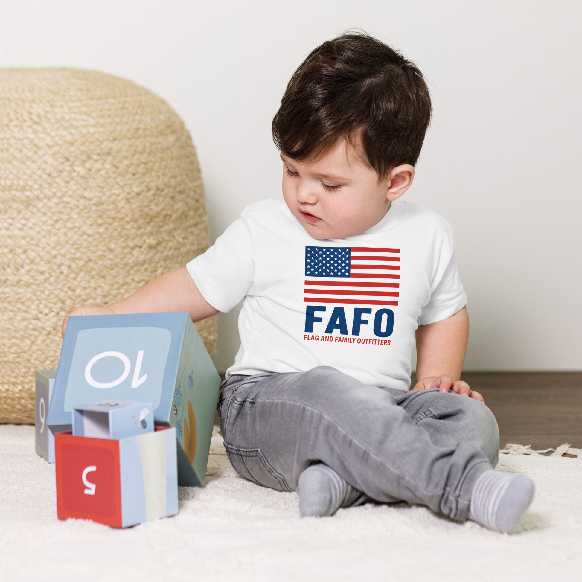 Toddler wearing white FAFO flag tee — patriotic toddler shirt FAFO apparel flag and family outfitters
